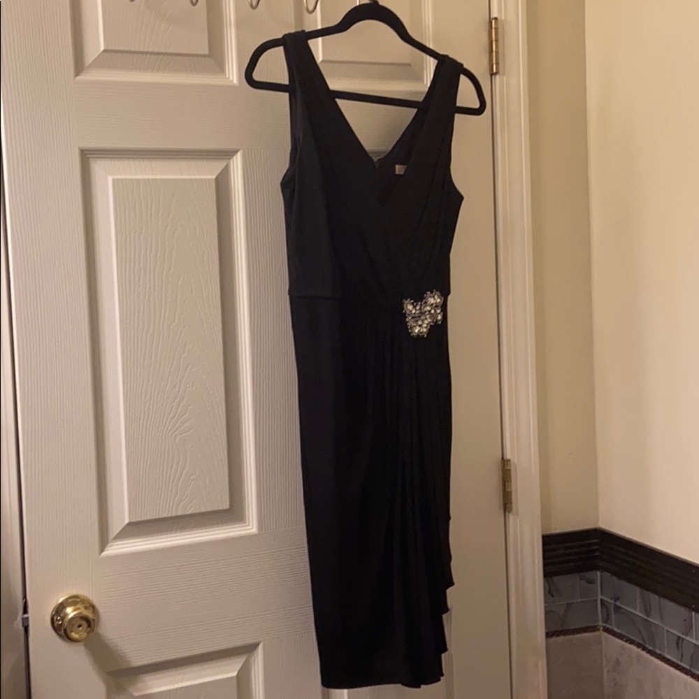 Black DS party dress with attached rhinestones.